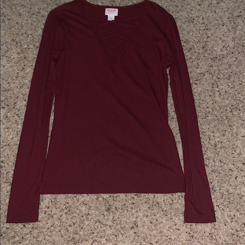 Maroon long sleeve top.